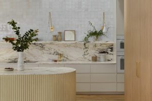 This is a photo of a marble kitchen in a renovated Queenslander in Brisbane.